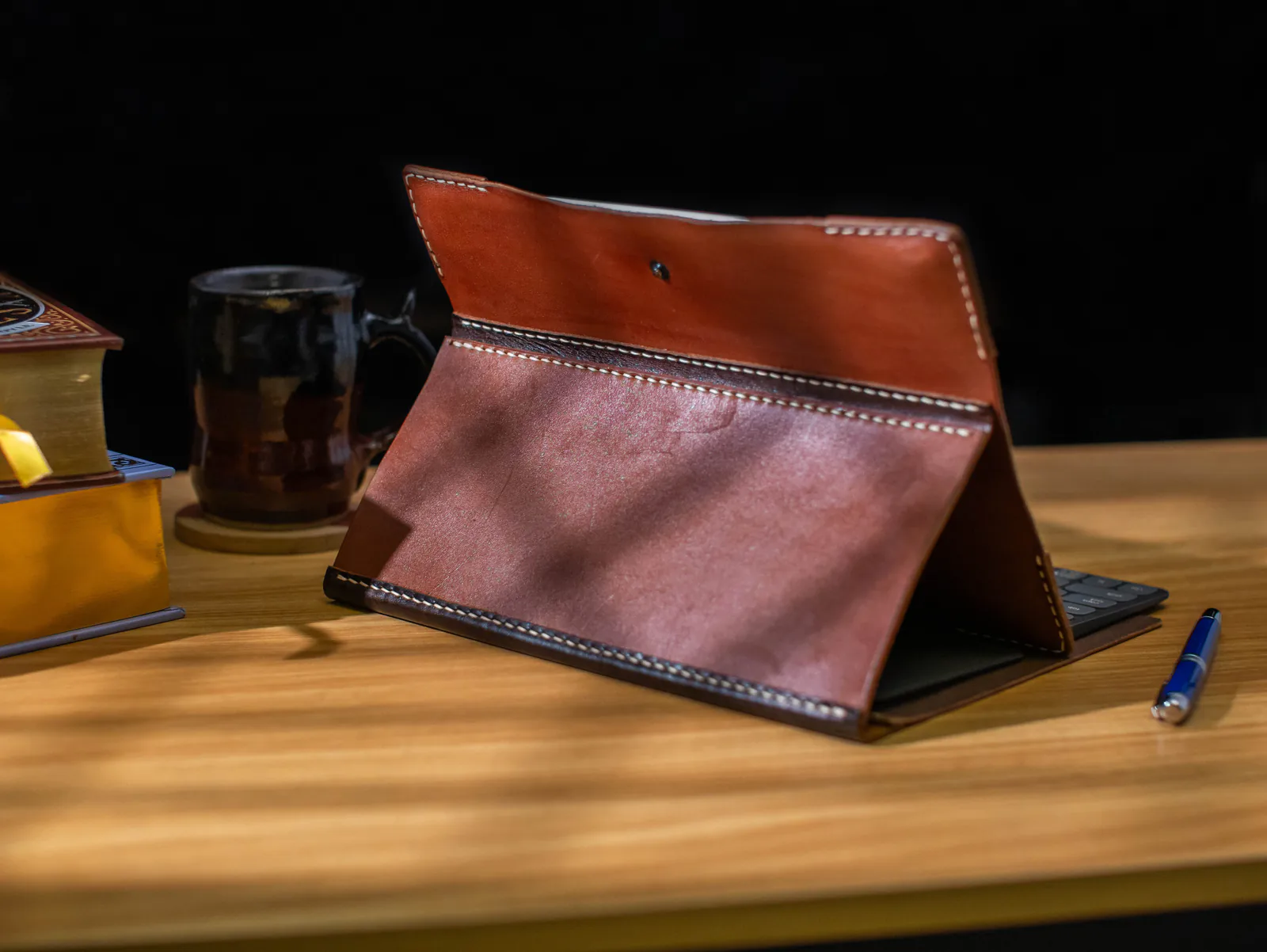The Bookish leather folio standing on a desk